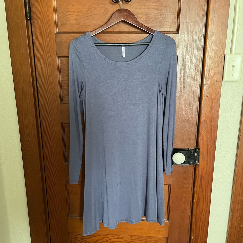 Gently used boutique dress size medium. Dusty blue in color